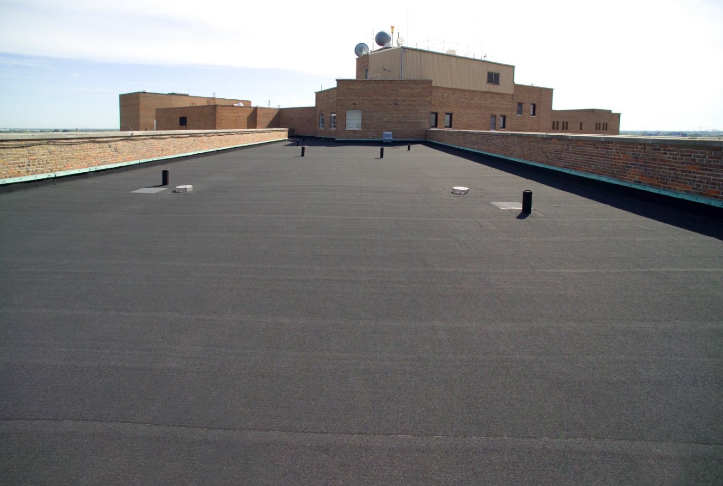 Commercial Flat Roof Repair | Roof Repair Line
